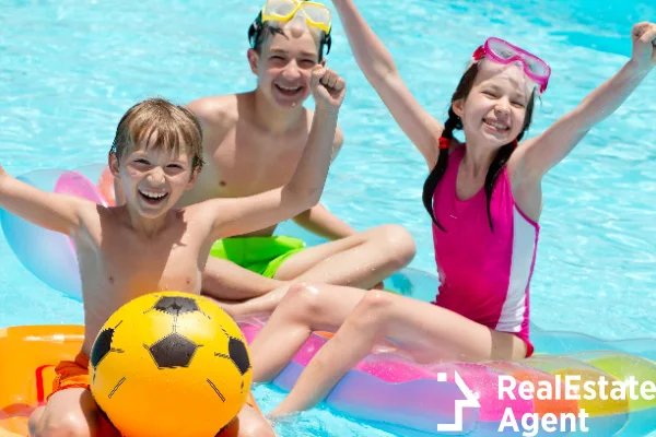 childrens playing in pool