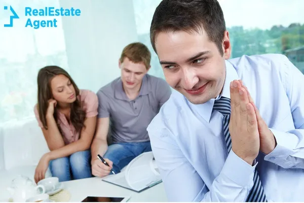 evil real estate agent being glad