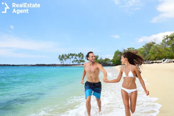 happy laughing couple on the beach