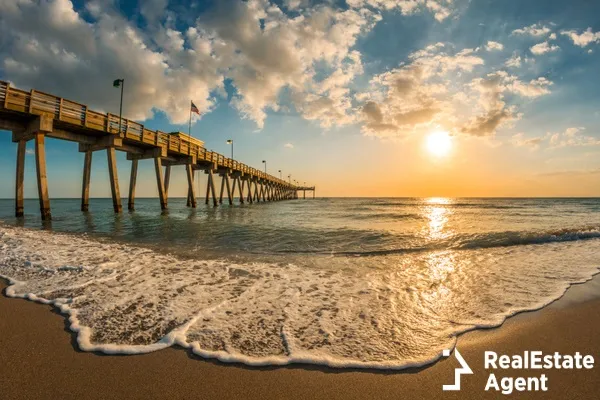 late afternoon sun over gulf mexico and venice pier