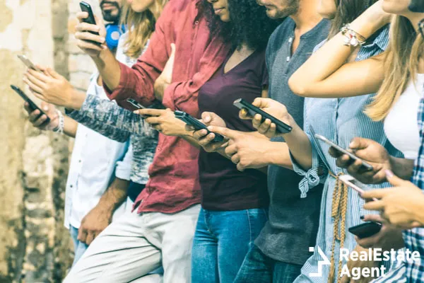 multicultural friends using smartphone