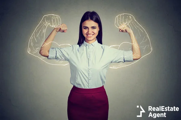 powerful confident woman flexing her muscles