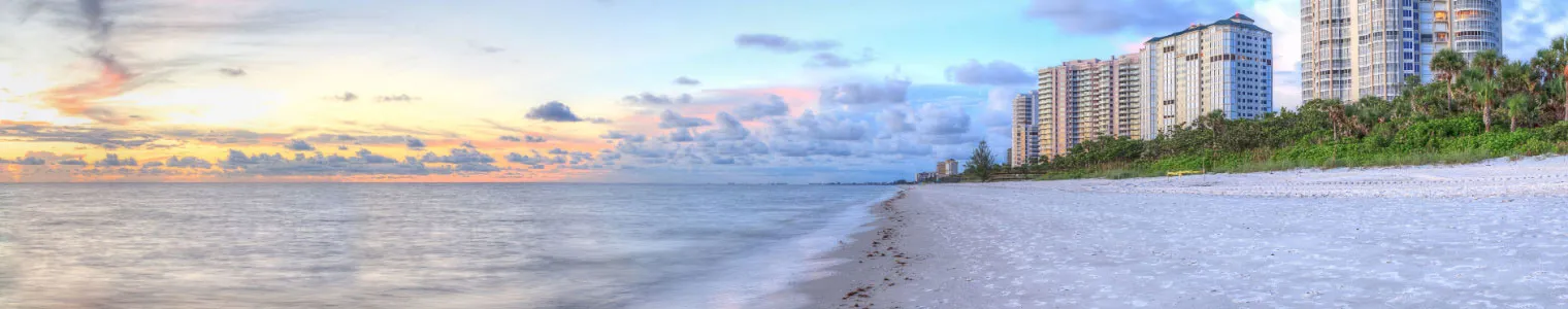 sunset over ocean beach naples