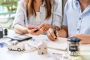 young couple managing home expenses