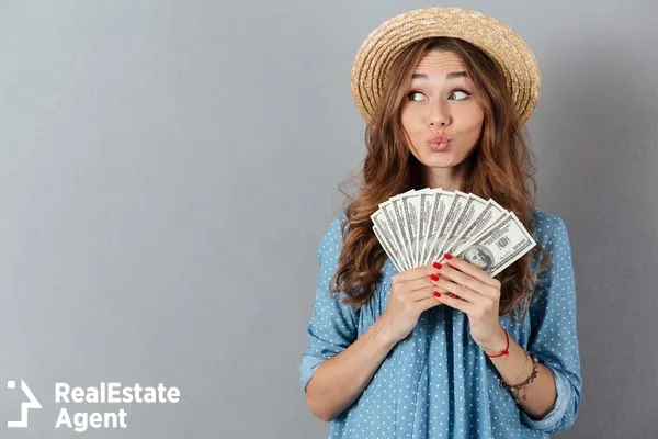 young women holding money