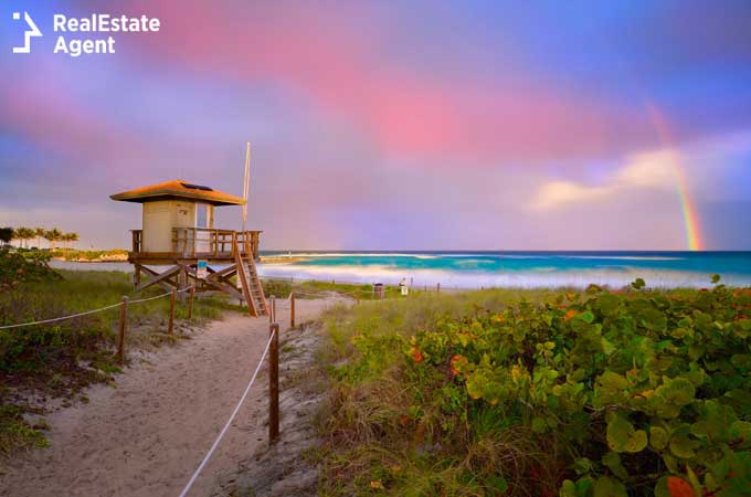 Boca Raton beach view with a beautiful rainbow over the ocean