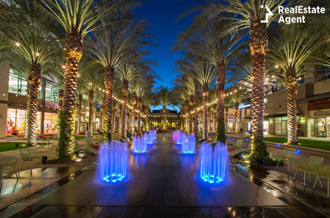 Splash pad lit up at night near Scottsdale Quarter shopping center